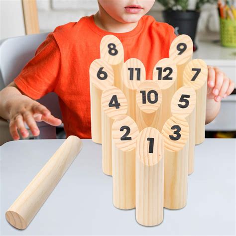 skittle scatter|beach game with wooden blocks.
